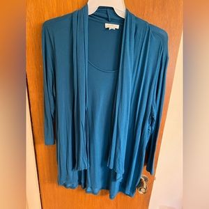 Teal color size large ladies top by Jaclyn Smith.